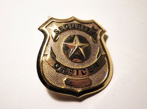 A police security badge